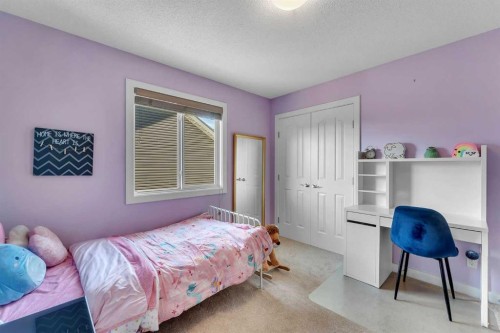 1535 Ravensmoor Way Se, Airdrie, AB - Indoor Photo Showing Bedroom