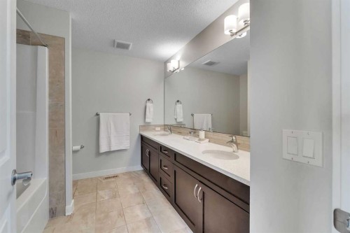 1535 Ravensmoor Way Se, Airdrie, AB - Indoor Photo Showing Bathroom