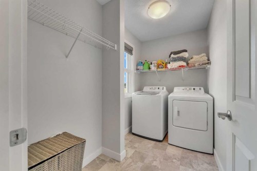 1535 Ravensmoor Way Se, Airdrie, AB - Indoor Photo Showing Laundry Room