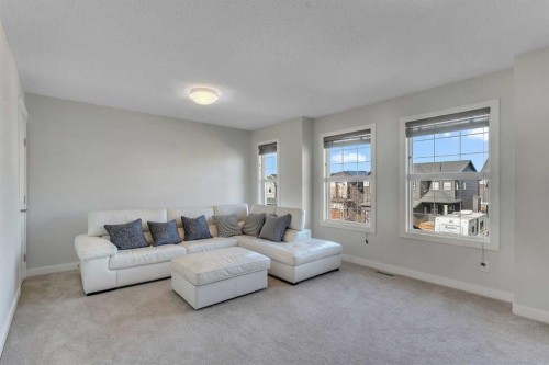 1535 Ravensmoor Way Se, Airdrie, AB - Indoor Photo Showing Living Room