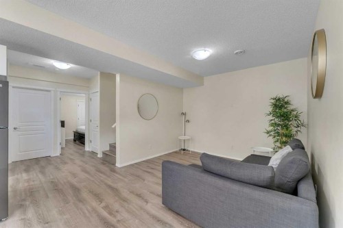 1535 Ravensmoor Way Se, Airdrie, AB - Indoor Photo Showing Other Room