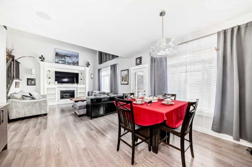 1368 Lackner Boulevard, Carstairs, AB - Indoor Photo Showing Other Room With Fireplace