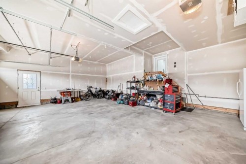 1368 Lackner Boulevard, Carstairs, AB - Indoor Photo Showing Garage