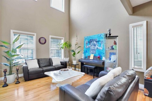 1065 Channelside Drive Sw, Airdrie, AB - Indoor Photo Showing Living Room