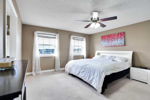1065 Channelside Drive Sw, Airdrie, AB - Indoor Photo Showing Bedroom
