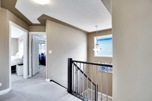 1065 Channelside Drive Sw, Airdrie, AB - Indoor Photo Showing Other Room