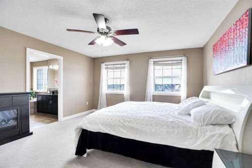 1065 Channelside Drive Sw, Airdrie, AB - Indoor Photo Showing Bedroom