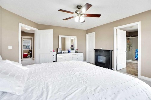 1065 Channelside Drive Sw, Airdrie, AB - Indoor Photo Showing Bedroom
