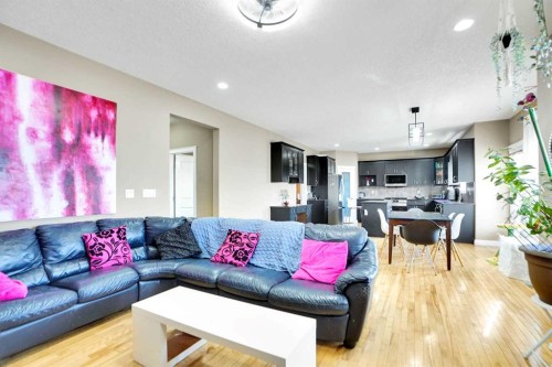 1065 Channelside Drive Sw, Airdrie, AB - Indoor Photo Showing Living Room