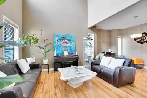 1065 Channelside Drive Sw, Airdrie, AB - Indoor Photo Showing Living Room