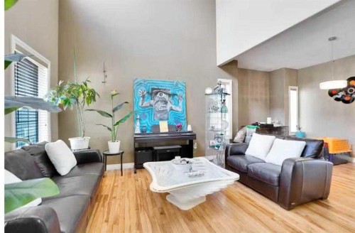 1065 Channelside Drive Sw, Airdrie, AB - Indoor Photo Showing Living Room