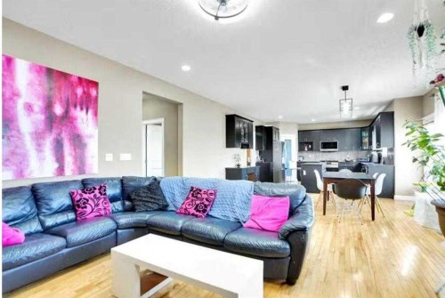 1065 Channelside Drive Sw, Airdrie, AB - Indoor Photo Showing Living Room