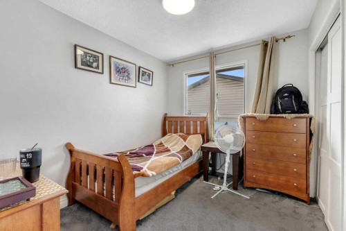 459 Templevale Drive Ne, Calgary, AB - Indoor Photo Showing Bedroom