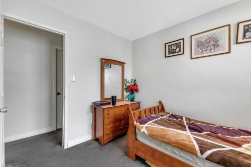 459 Templevale Drive Ne, Calgary, AB - Indoor Photo Showing Bedroom