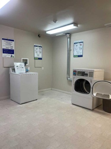 17-170 N Railway Street, Okotoks, AB - Indoor Photo Showing Laundry Room