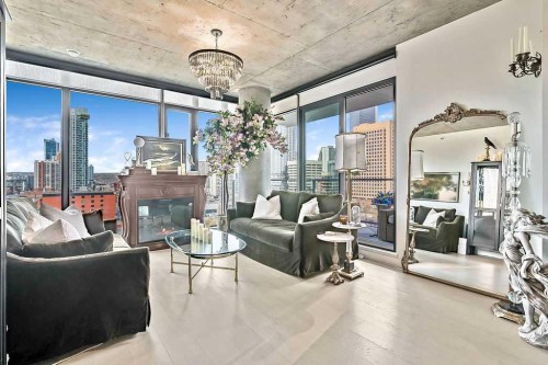 903-1010 6 Street Sw, Calgary, AB - Indoor Photo Showing Living Room With Fireplace