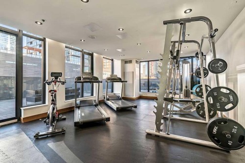 903-1010 6 Street Sw, Calgary, AB - Indoor Photo Showing Gym Room