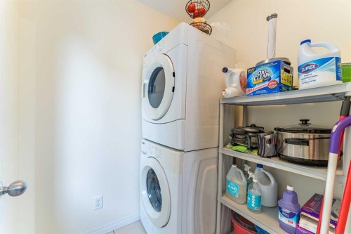 37 Auburn Bay Link Se, Calgary, AB - Indoor Photo Showing Laundry Room