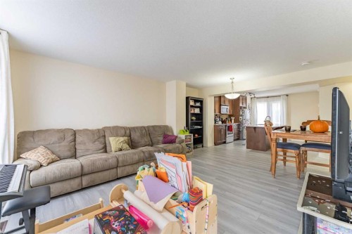 37 Auburn Bay Link Se, Calgary, AB - Indoor Photo Showing Living Room