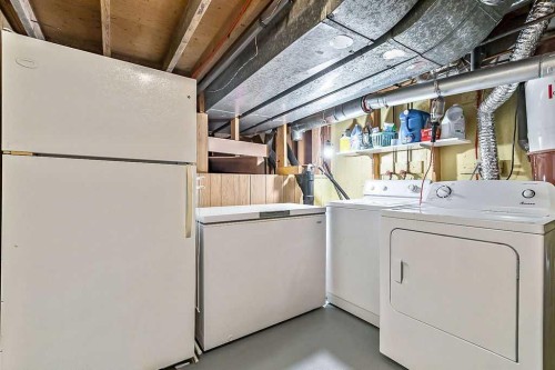 5279 Dalcroft Crescent Nw, Calgary, AB - Indoor Photo Showing Laundry Room
