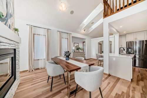 58 Panatella Lane Nw, Calgary, AB - Indoor With Fireplace