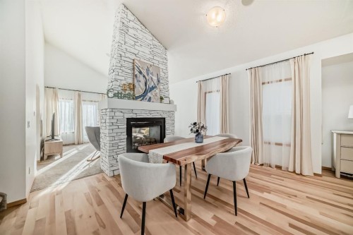 58 Panatella Lane Nw, Calgary, AB - Indoor With Fireplace