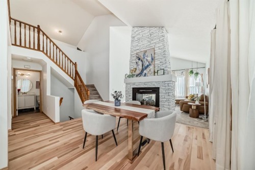 58 Panatella Lane Nw, Calgary, AB - Indoor With Fireplace