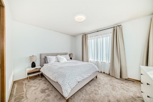 58 Panatella Lane Nw, Calgary, AB - Indoor Photo Showing Bedroom