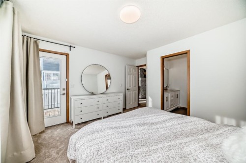 58 Panatella Lane Nw, Calgary, AB - Indoor Photo Showing Bedroom