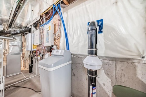 58 Panatella Lane Nw, Calgary, AB - Indoor Photo Showing Laundry Room
