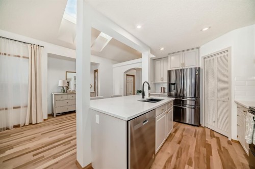 58 Panatella Lane Nw, Calgary, AB - Indoor Photo Showing Kitchen With Double Sink With Upgraded Kitchen
