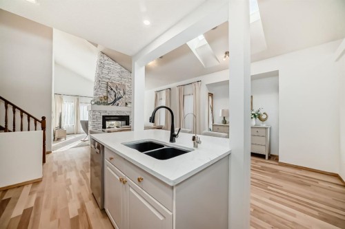 58 Panatella Lane Nw, Calgary, AB - Indoor Photo Showing Kitchen With Double Sink