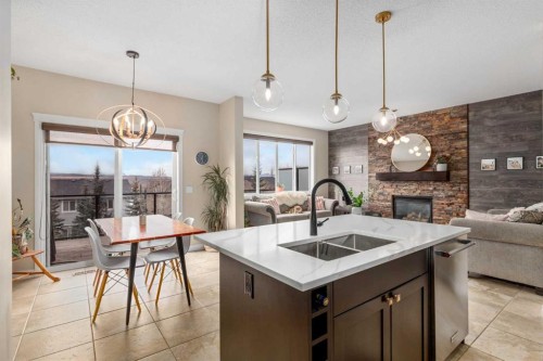 40 Heritage Hill, Cochrane, AB - Indoor With Fireplace