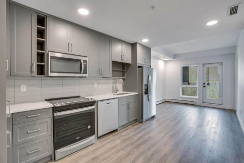 2113-350 Livingston Common Ne, Calgary, AB - Indoor Photo Showing Kitchen With Upgraded Kitchen