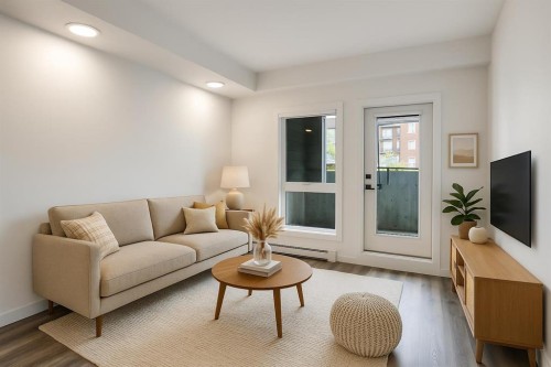 2113-350 Livingston Common Ne, Calgary, AB - Indoor Photo Showing Living Room