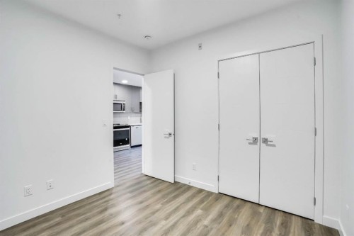 2113-350 Livingston Common Ne, Calgary, AB - Indoor Photo Showing Other Room