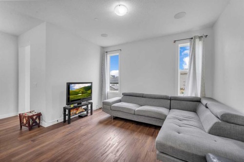 165 Hotchkiss Way Se, Calgary, AB - Indoor Photo Showing Living Room