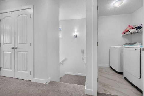 165 Hotchkiss Way Se, Calgary, AB - Indoor Photo Showing Laundry Room