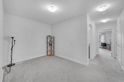 165 Hotchkiss Way Se, Calgary, AB - Indoor Photo Showing Other Room