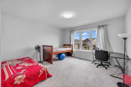 165 Hotchkiss Way Se, Calgary, AB - Indoor Photo Showing Bedroom