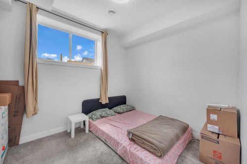 165 Hotchkiss Way Se, Calgary, AB - Indoor Photo Showing Bedroom