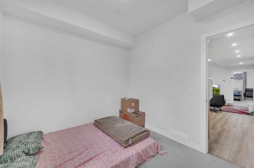 165 Hotchkiss Way Se, Calgary, AB - Indoor Photo Showing Bedroom