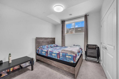 165 Hotchkiss Way Se, Calgary, AB - Indoor Photo Showing Bedroom
