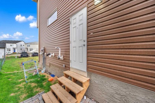 165 Hotchkiss Way Se, Calgary, AB - Outdoor With Deck Patio Veranda With Exterior