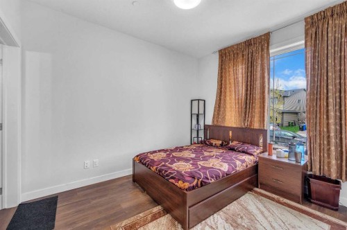 165 Hotchkiss Way Se, Calgary, AB - Indoor Photo Showing Bedroom