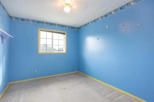 29 Spring Crescent Sw, Calgary, AB - Indoor Photo Showing Other Room