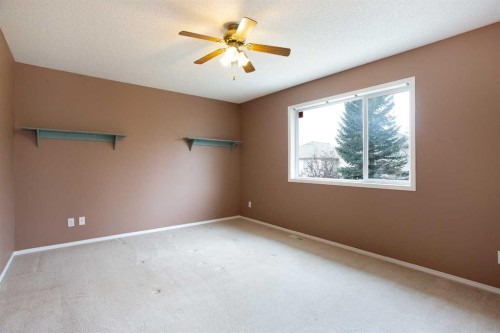29 Spring Crescent Sw, Calgary, AB - Indoor Photo Showing Other Room