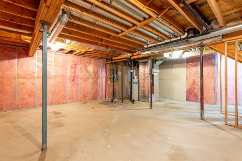 29 Spring Crescent Sw, Calgary, AB - Indoor Photo Showing Basement