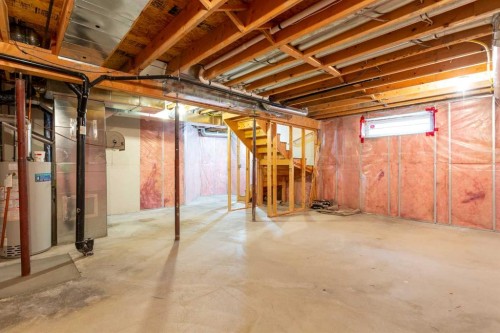 29 Spring Crescent Sw, Calgary, AB - Indoor Photo Showing Basement