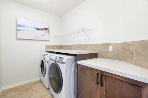 163 Cranarch Landing Se, Calgary, AB - Indoor Photo Showing Laundry Room